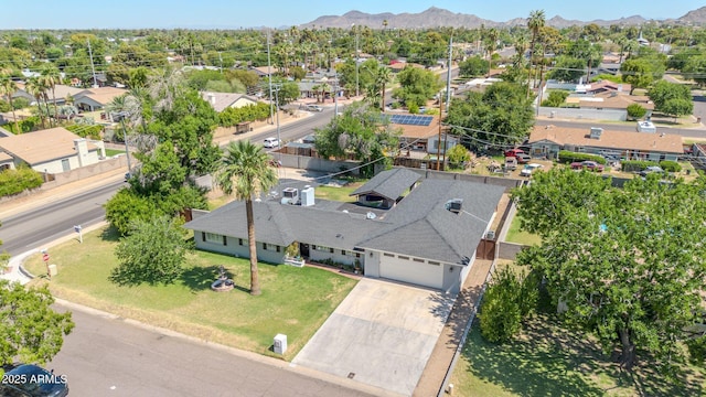 1208 E Tuckey Ln, Phoenix, AZ 85014 - aerial perspective of suburban area featuring a mountain backdrop