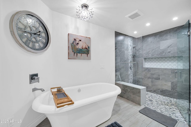 1208 E Tuckey Ln, Phoenix, AZ 85014 - full bathroom featuring a freestanding bath, a stall shower, and recessed lighting