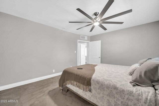 1208 E Tuckey Ln, Phoenix, AZ 85014 - carpeted bedroom featuring baseboards and a ceiling fan