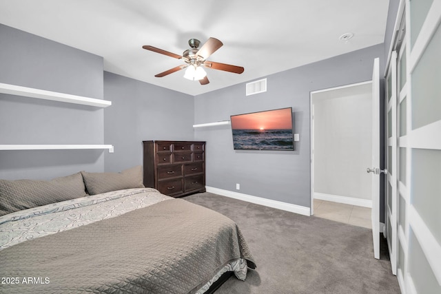 1208 E Tuckey Ln, Phoenix, AZ 85014 - bedroom featuring carpet floors and a ceiling fan