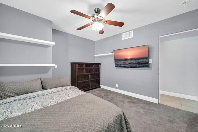 1208 E Tuckey Ln, Phoenix, AZ 85014 - bedroom with carpet floors and a ceiling fan