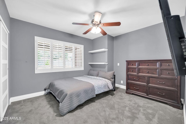1208 E Tuckey Ln, Phoenix, AZ 85014 - bedroom with light carpet and a ceiling fan