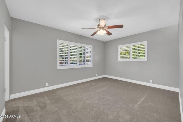 1208 E Tuckey Ln, Phoenix, AZ 85014 - spare room with healthy amount of natural light, a ceiling fan, and carpet floors