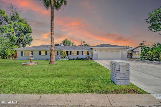 1208 E Tuckey Ln, Phoenix, AZ 85014 - single story home with driveway, a garage, and a yard