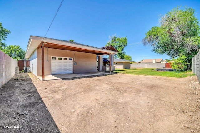 1208 E Tuckey Ln, Phoenix, AZ 85014 - garage with dirt driveway