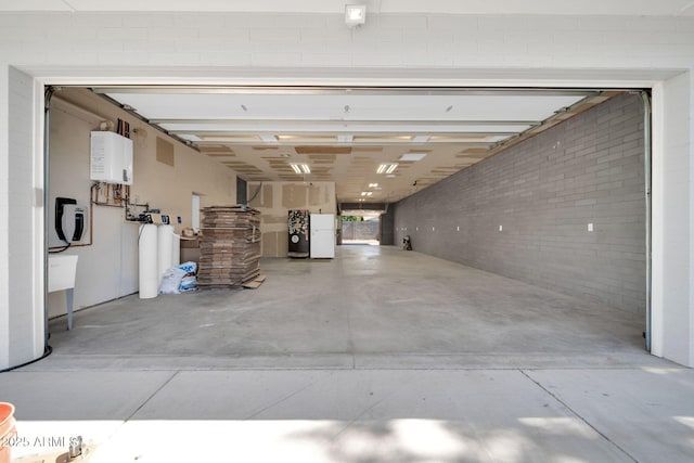 1208 E Tuckey Ln, Phoenix, AZ 85014 - garage featuring tankless water heater