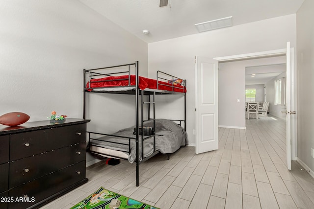 12357 W Whyman Ave, Avondale, AZ 85323 - bedroom with light wood-type flooring and baseboards