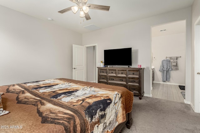 12357 W Whyman Ave, Avondale, AZ 85323 - bedroom featuring carpet flooring, baseboards, ceiling fan, and connected bathroom