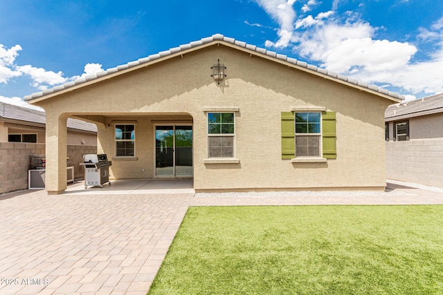 12357 W Whyman Ave, Avondale, AZ 85323 - rear view of property featuring a patio area and stucco siding