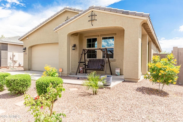 12357 W Whyman Ave, Avondale, AZ 85323 - view of front of property with an attached garage and stucco siding
