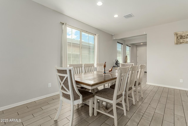 12357 W Whyman Ave, Avondale, AZ 85323 - dining space featuring wood finish floors, baseboards, and recessed lighting