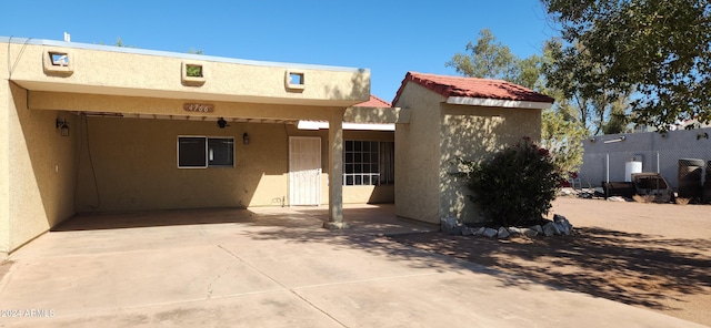 back of house featuring a patio