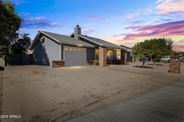 view of front of property with a garage