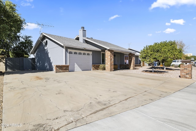 single story home with a garage