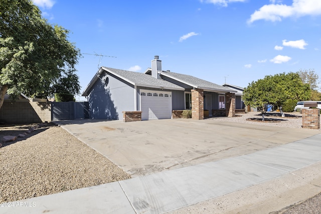 single story home with a garage