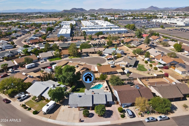 drone / aerial view featuring a mountain view