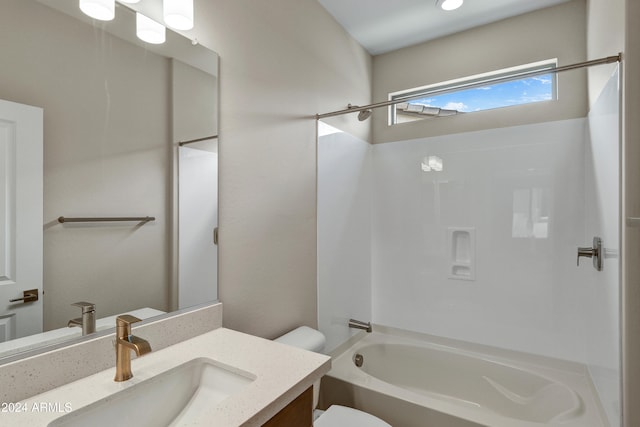 full bathroom featuring shower / bathing tub combination, vanity, and toilet