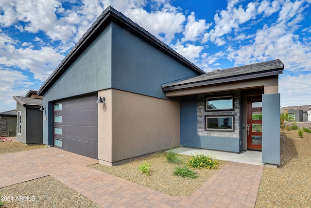 contemporary home with a garage