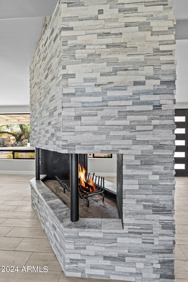 details featuring a stone fireplace