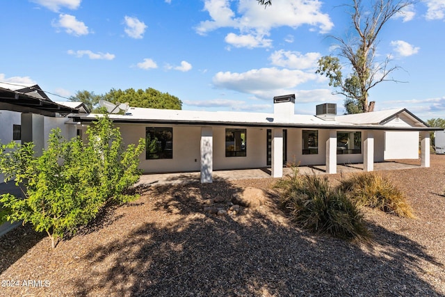 single story home with a patio