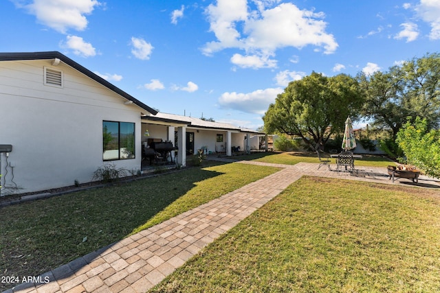 view of yard with a patio