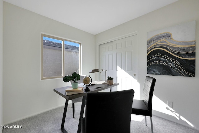 view of carpeted dining space