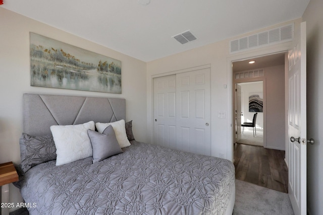 bedroom with a closet and carpet