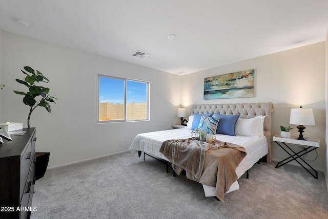 bedroom featuring light colored carpet