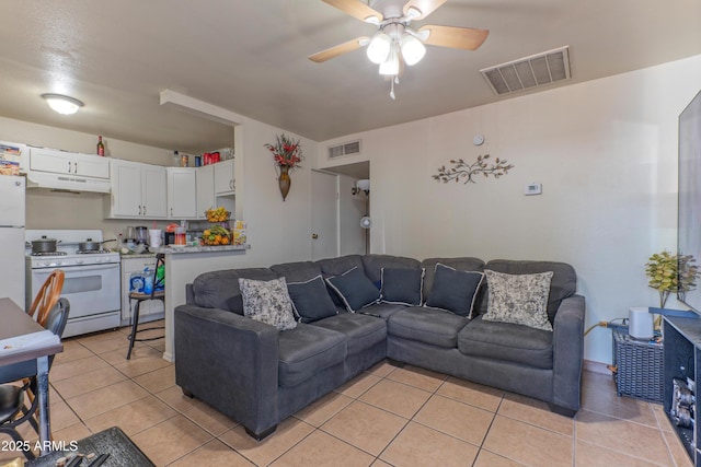 2017 E Lemon St, Tempe, AZ 85281 - living area with a ceiling fan and light tile patterned floors