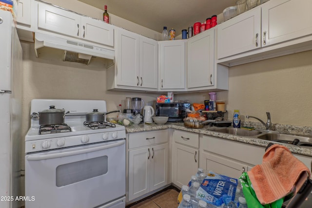 2017 E Lemon St, Tempe, AZ 85281 - kitchen featuring white appliances, under cabinet range hood, white cabinetry, and tile patterned floors