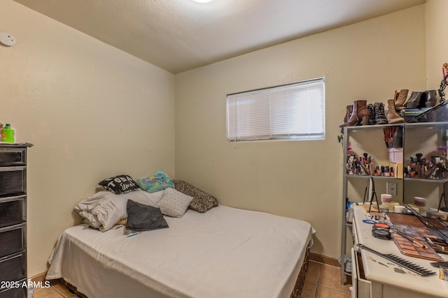 2017 E Lemon St, Tempe, AZ 85281 - tiled bedroom with baseboards