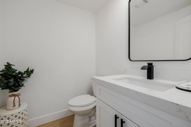 7710 E Gainey Ranch Rd E Unit 115, Scottsdale, AZ 85258 - half bath with vanity and wood finished floors