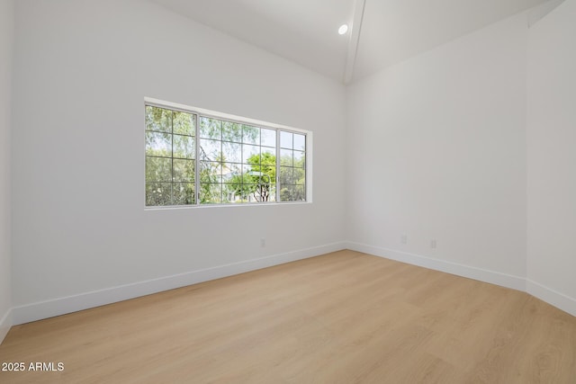 7710 E Gainey Ranch Rd E Unit 115, Scottsdale, AZ 85258 - empty room featuring light wood-style floors and baseboards