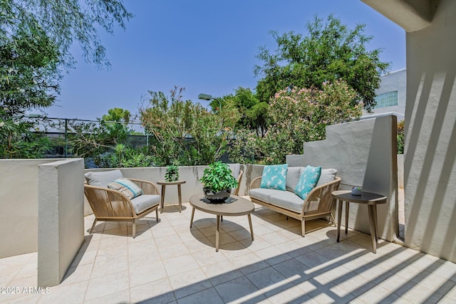 7710 E Gainey Ranch Rd E Unit 115, Scottsdale, AZ 85258 - view of patio / terrace featuring an outdoor hangout area