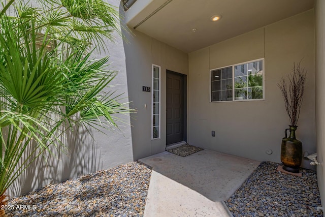 7710 E Gainey Ranch Rd E Unit 115, Scottsdale, AZ 85258 - property entrance featuring stucco siding