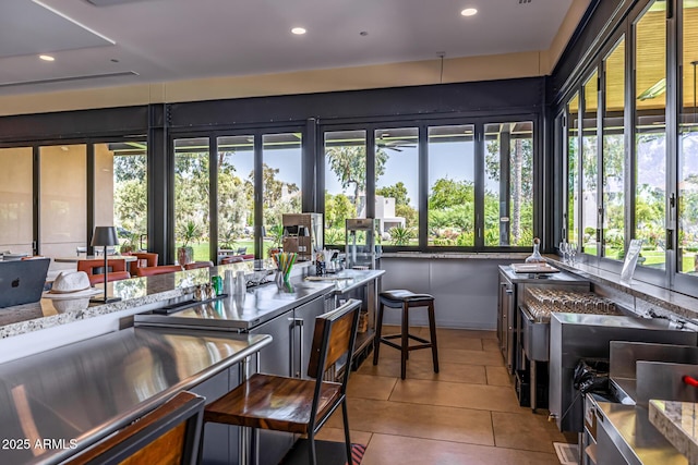7710 E Gainey Ranch Rd E Unit 115, Scottsdale, AZ 85258 - sunroom / solarium with healthy amount of natural light