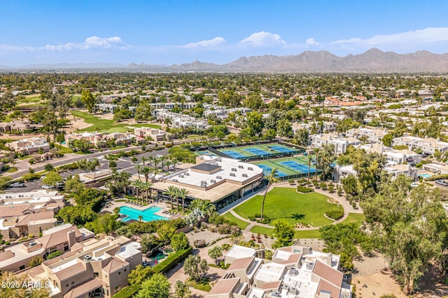 7710 E Gainey Ranch Rd E Unit 115, Scottsdale, AZ 85258 - aerial view of residential area featuring a pool area and a mountainous background
