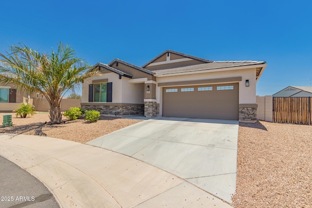 40913 W Williams Way, Maricopa, AZ 85138 - craftsman-style house featuring stone siding, stucco siding, concrete driveway, an attached garage, and a tile roof