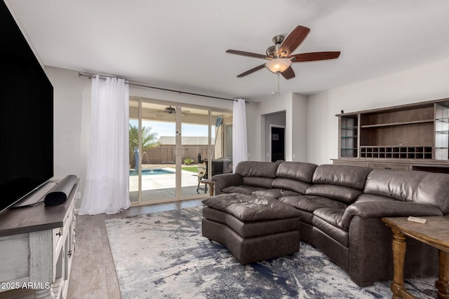 40913 W Williams Way, Maricopa, AZ 85138 - living area featuring ceiling fan and wood finished floors