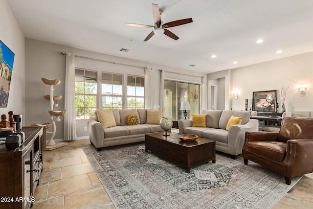 living room featuring ceiling fan