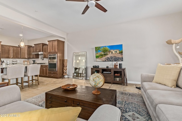 living room with ceiling fan