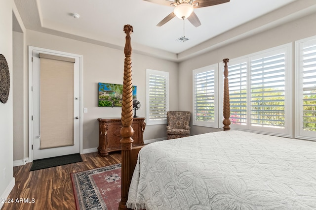 bedroom featuring dark hardwood / wood-style floors and ceiling fan