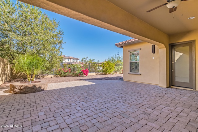 view of patio / terrace featuring ceiling fan