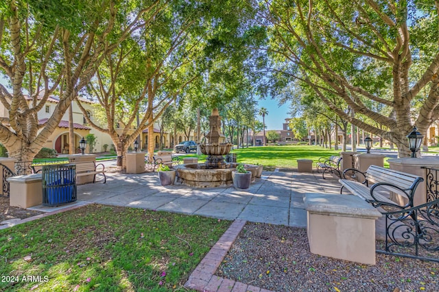 view of community with a patio area and a yard