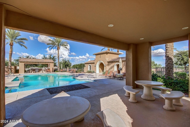 view of pool with a patio