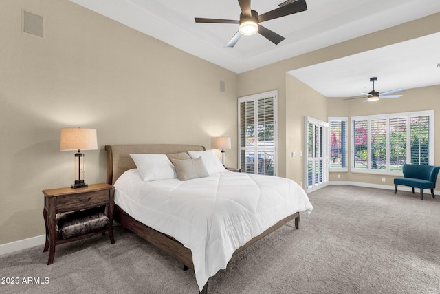 bedroom with carpet flooring, visible vents, baseboards, and ceiling fan