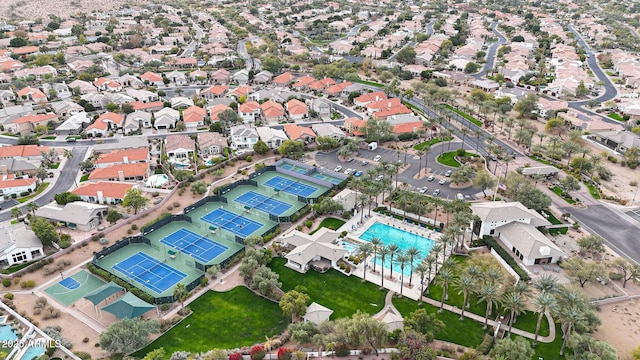 birds eye view of property with a residential view