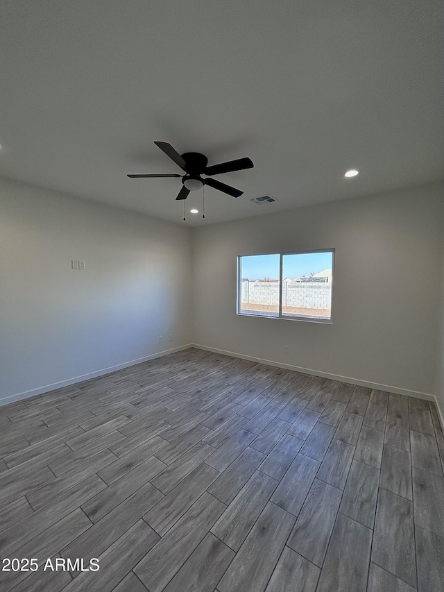 empty room featuring ceiling fan