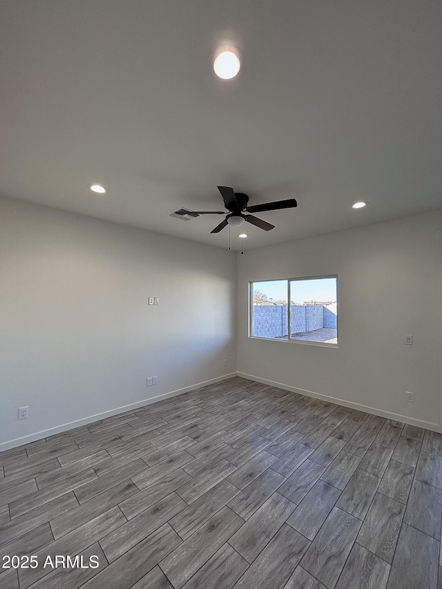 empty room featuring ceiling fan