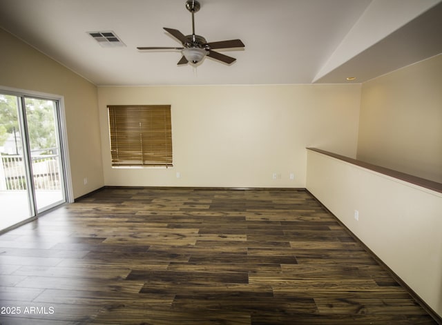 20221 N 31st St, Phoenix, AZ 85050 - empty room featuring vaulted ceiling, ceiling fan, and dark wood-type flooring